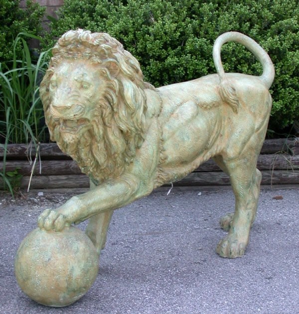 Lion with Ball Metropolitan Galleries Inc.