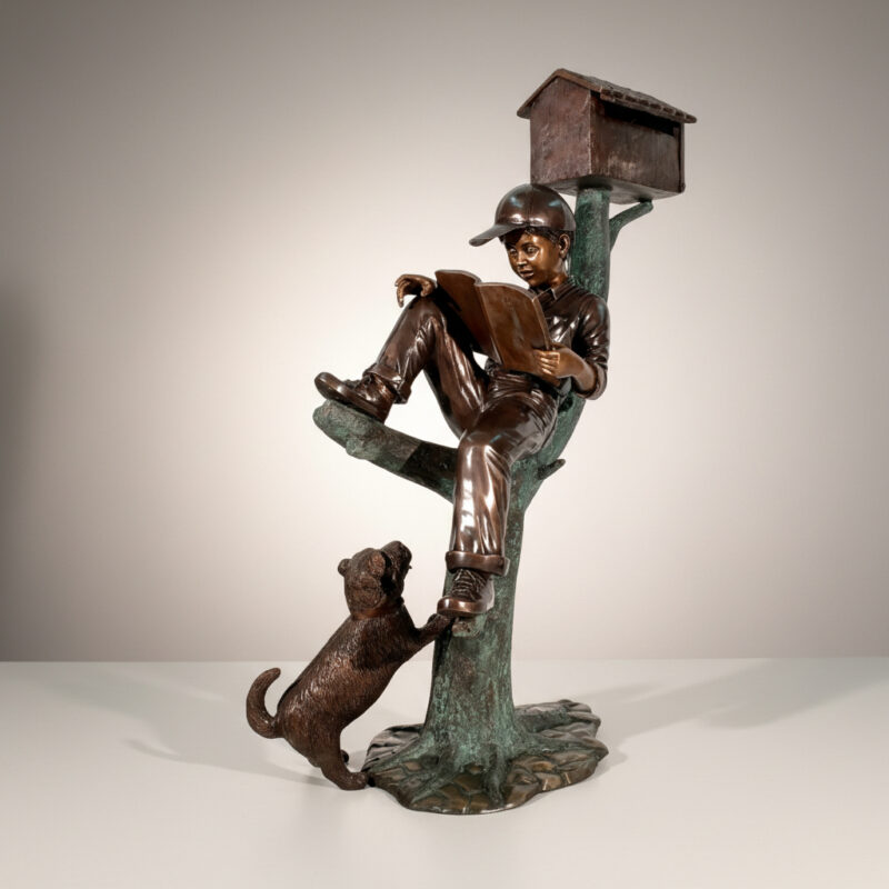 SRB48649 Bronze Boy Reading on Tree with Dog Mailbox Sculpture by Metropolitan Galleries Inc.