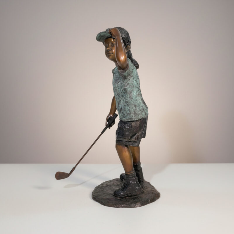SRB705766 Bronze Girl Golfer in Verdi Top Sculpture by Metropolitan Galleries Inc.