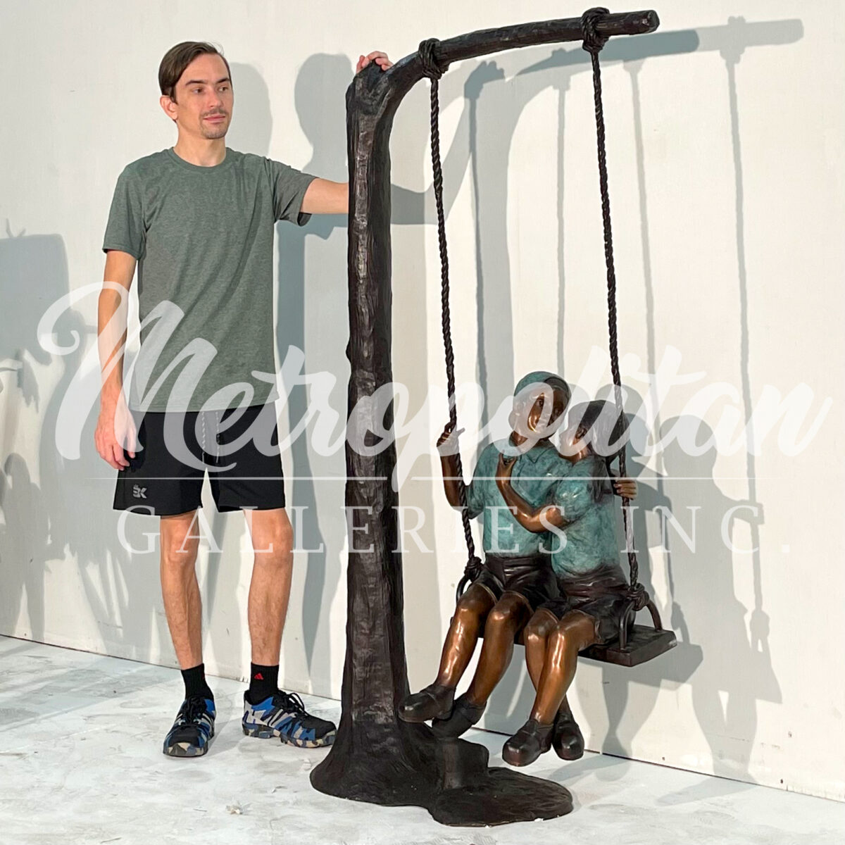 Bronze Children on Tree Swing Sculpture Metropolitan Galleries Inc.