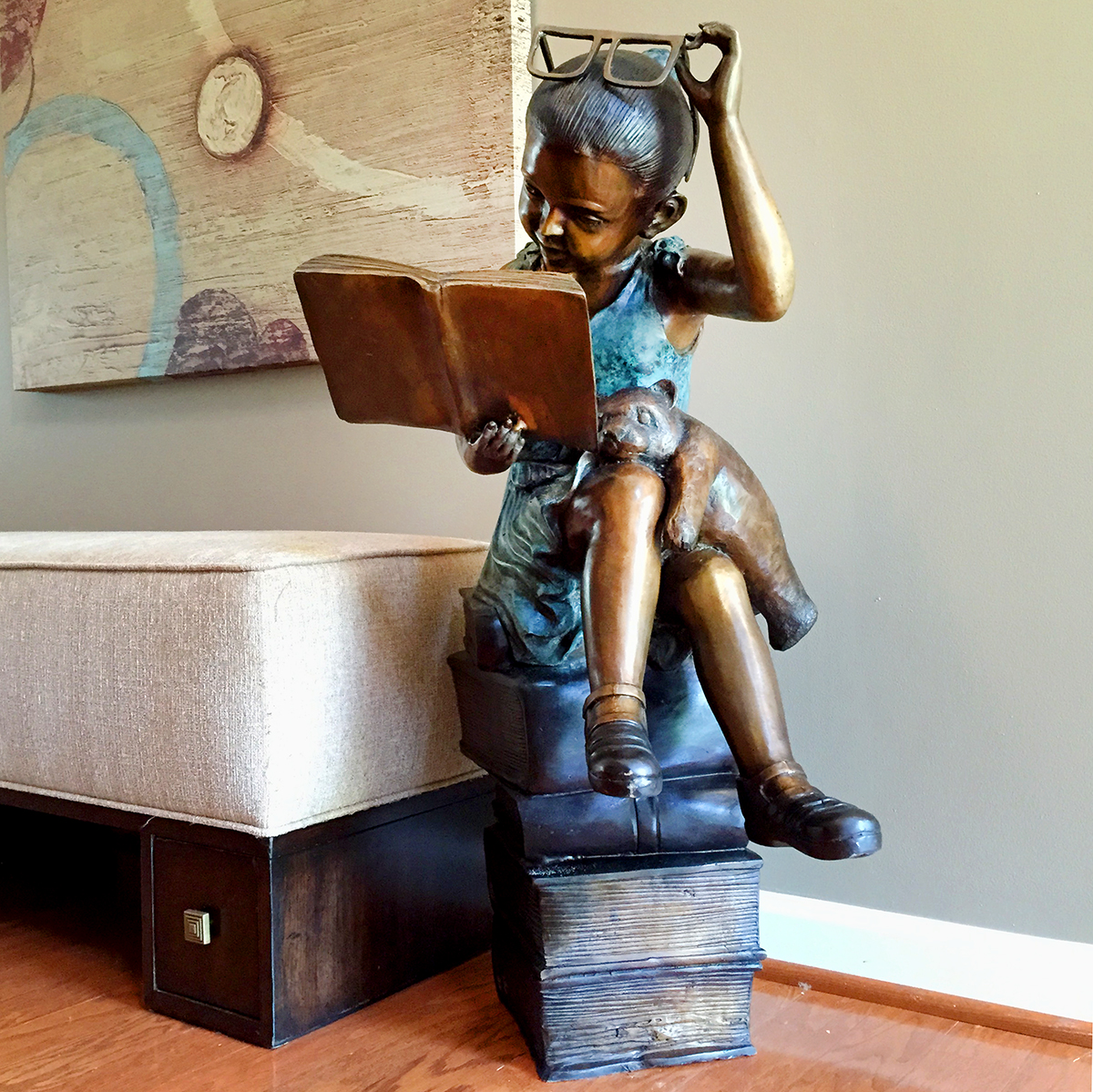 SRB097131 Bronze Girl reading on Books Sculpture Metropolitan Galleries Inc.