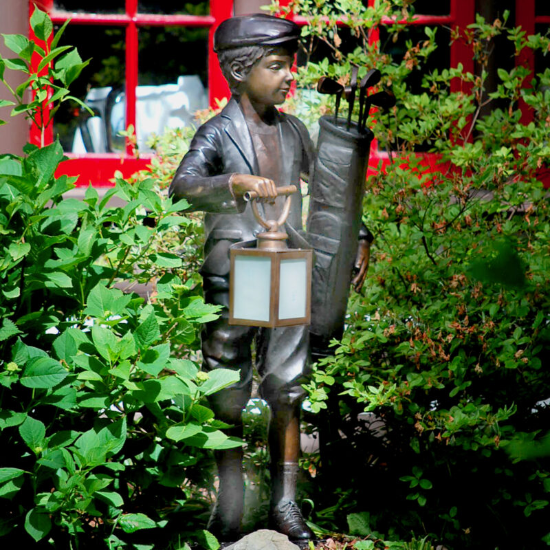 Cast Bronze Golfer Caddy Lantern Sculpture by Metropolitan Galleries. We have a wide range of cast bronze statues, bronze fountains, and bronze statuary in
