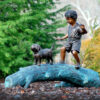 Bronze Boy and Dog walking on Log Sculpture