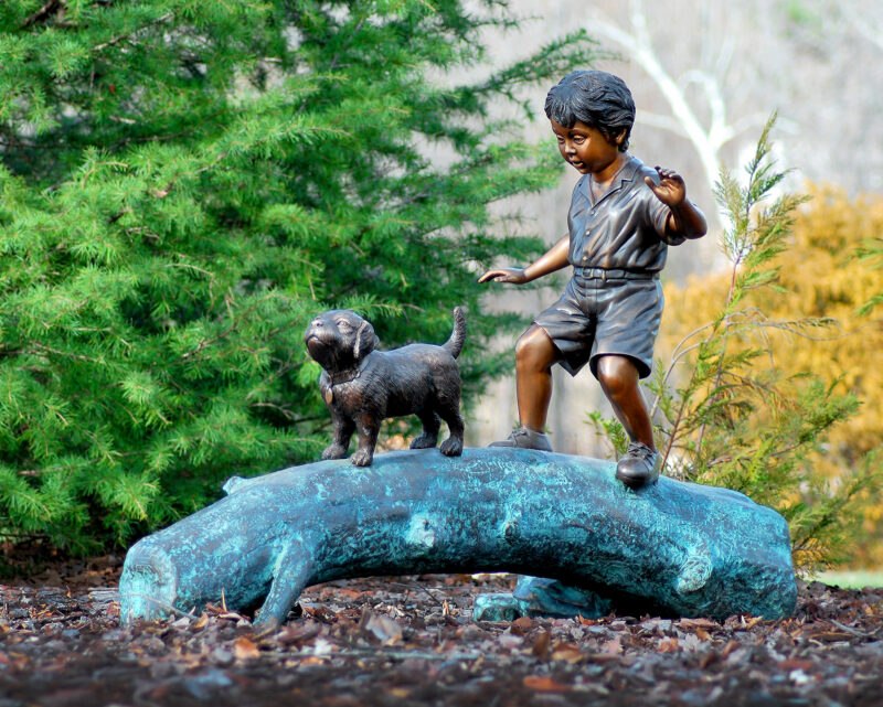 SRB45566 Bronze Boy & Dog Walking on Log Sculpture by Metropolitan Galleries Inc