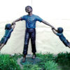 Bronze Father swinging Children Sculpture