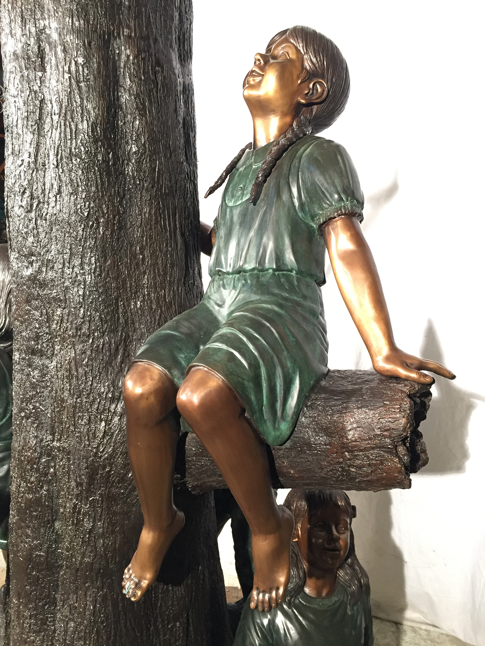 SRB48188 Bronze Children in Treehouse Sculpture Metropolitan Galleries Inc.