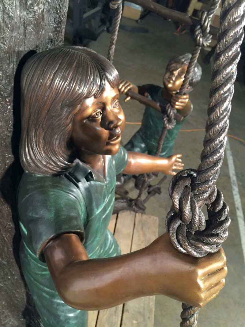 SRB48188 Bronze Children in Treehouse Sculpture Metropolitan Galleries Inc.