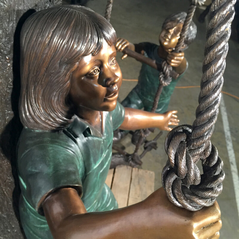 SRB48188 Bronze Children in Treehouse Sculpture Metropolitan Galleries Inc.