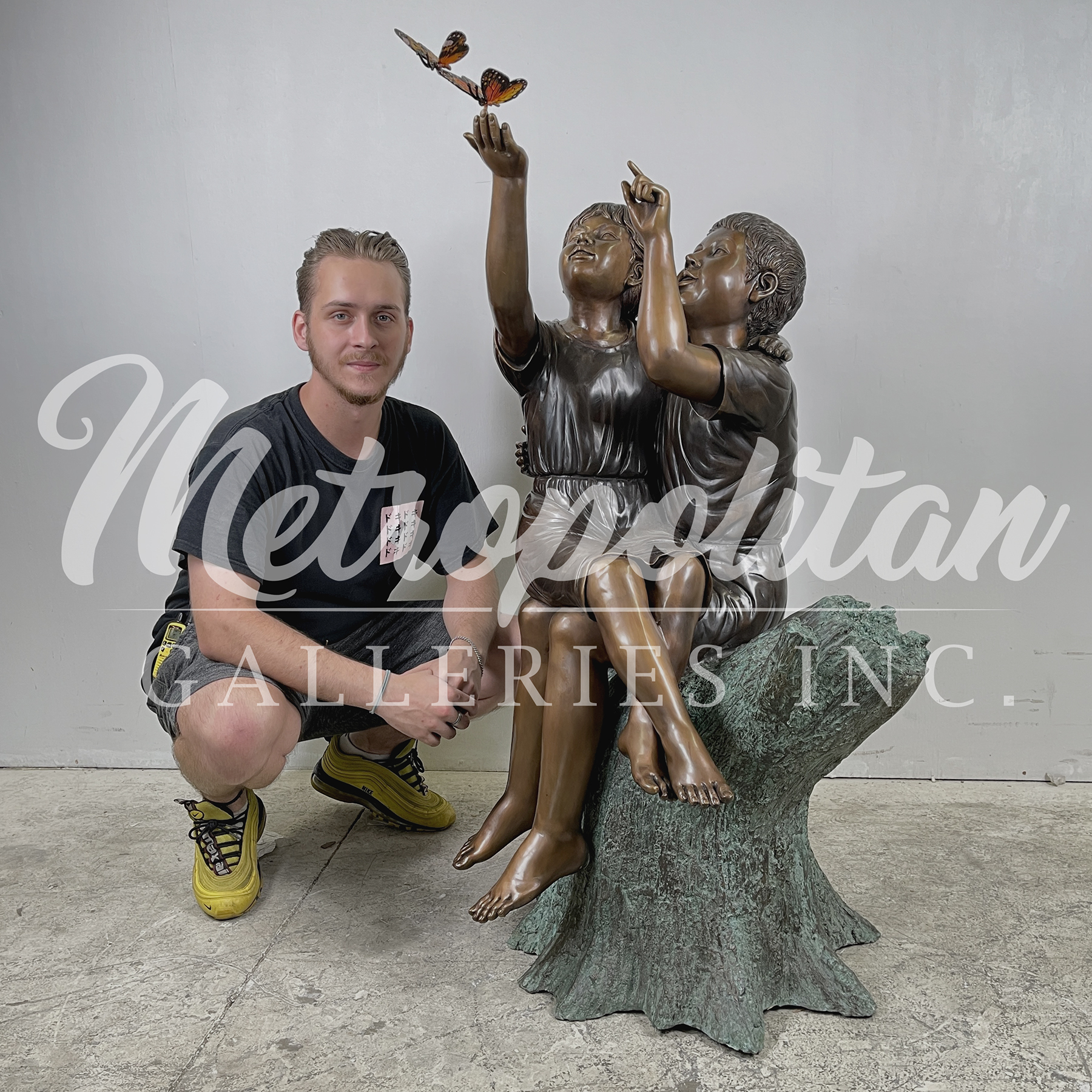 SRB48247 Bronze Children on Stump with Monarch Butterflies Sculpture by Metropolitan Galleries Inc SCALE WM