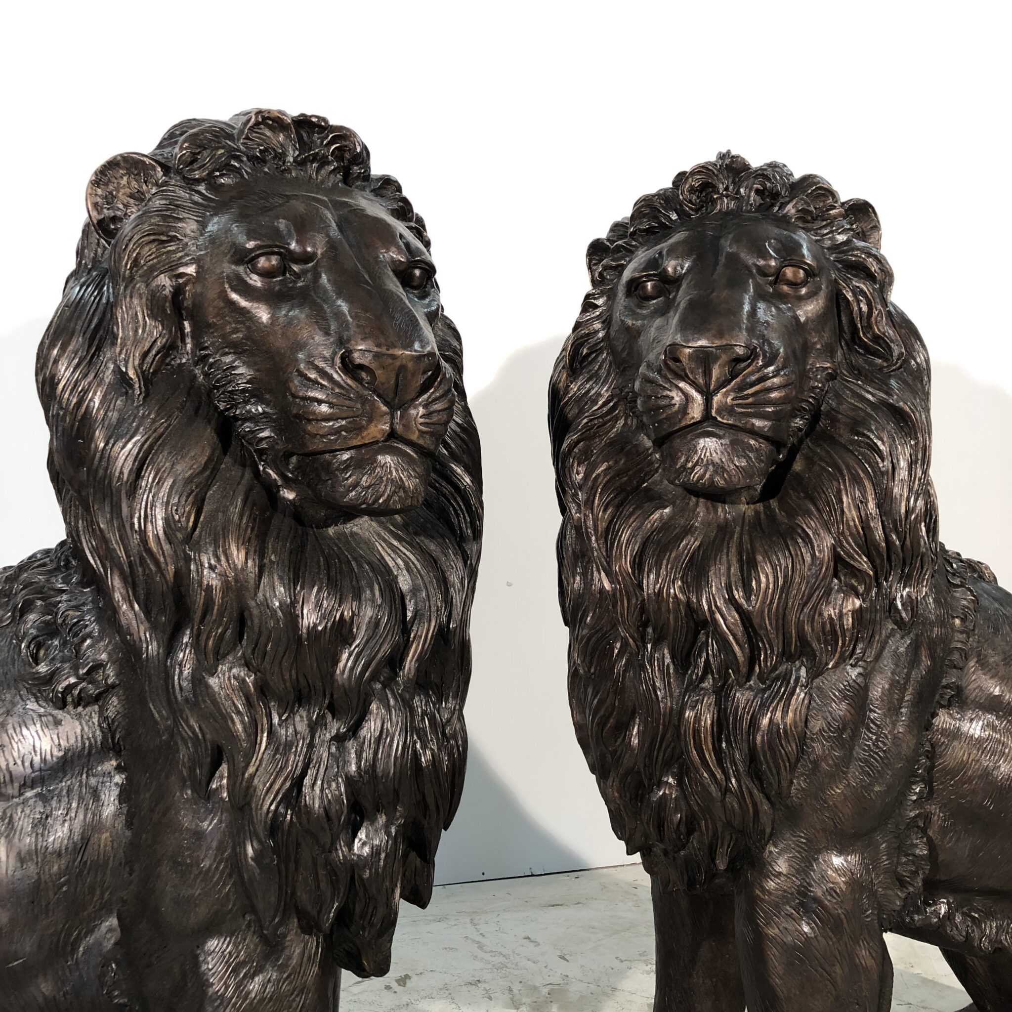 Bronze Large Sitting Lion Sculpture Pair Metropolitan Galleries Inc.