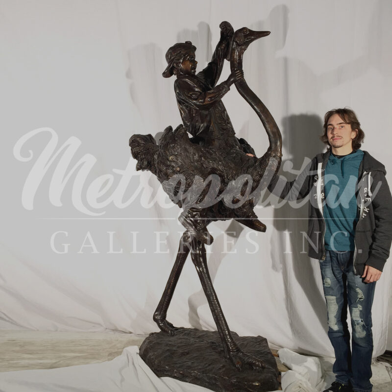 SRB96090 Bronze Boy riding Ostrich Sculpture by Metropolitan Galleries Inc SCALE WM