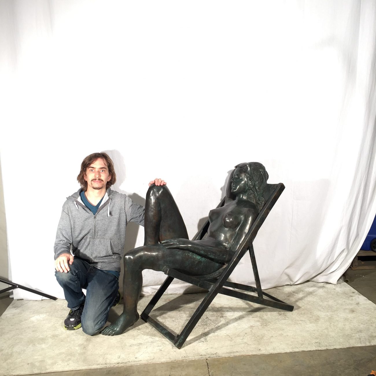 Metropolitan Galleries Cast Bronze Nude Woman in Deck Chair Statue
