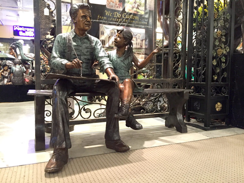 SRB071050_Showroom_Man_on_Bench