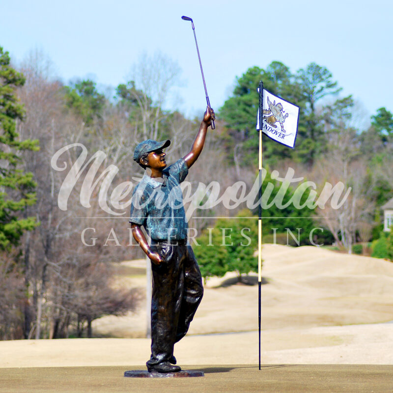 SRB705752 Bronze Golfer holding up Club Sculpture on Grandover Golf Course by Metropolitan Galleries Inc