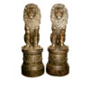 Bronze Sitting Lions on Pedestals Sculpture Pair
