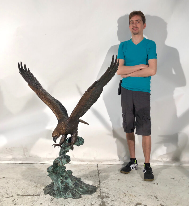 SRB41107 Bronze Eagle on Waves Sculpture SCALE Metropolitan Galleries Inc.