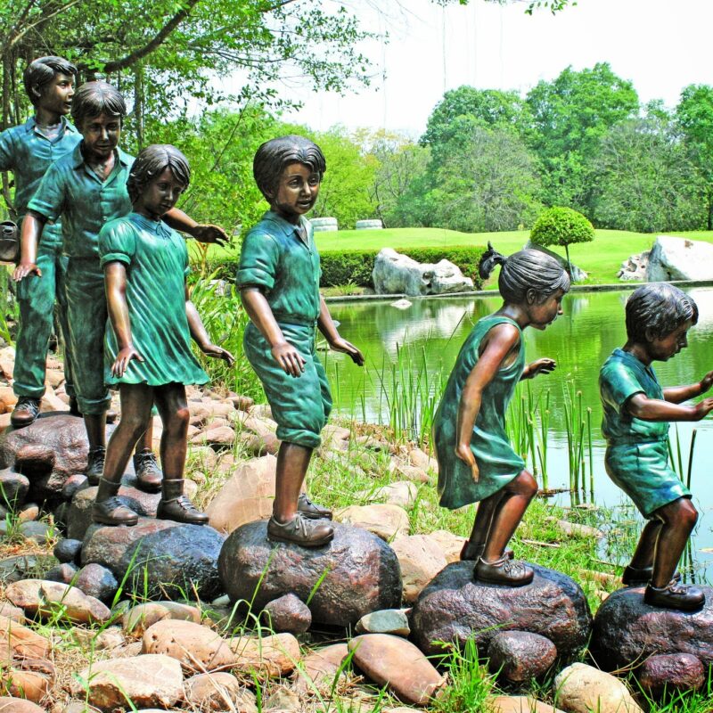 SRB48814 Bronze Six Children Walking on Rocks Sculpture Metropolitan Galleries Inc