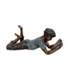 Bronze Boy Laying on Belly Reading Book Sculpture