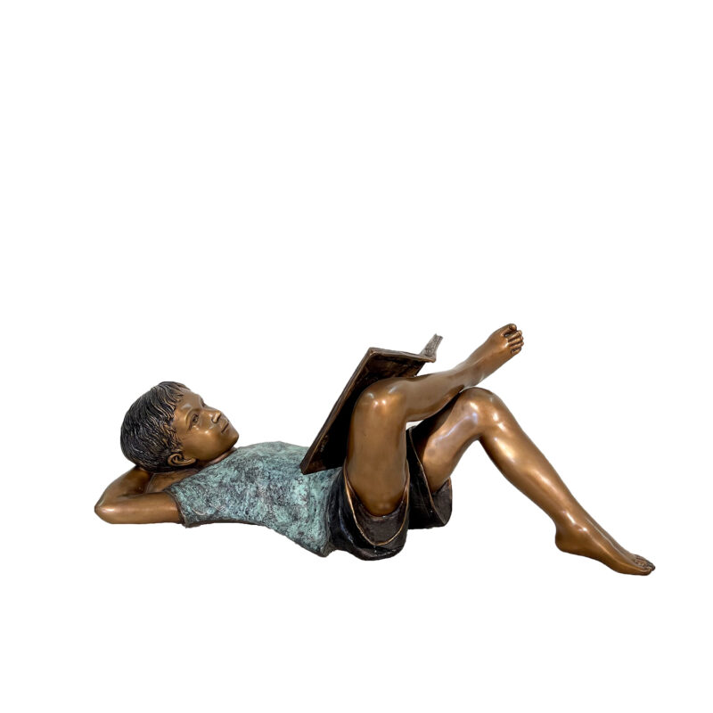 SRB705760 Bronze Laying Boy Reading Book Sculpture in Three Color Patina by Metropolitan Galleries Inc
