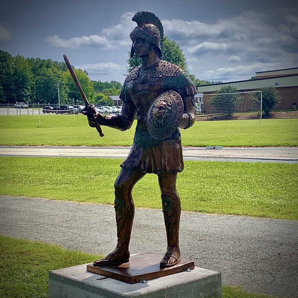 SRB052749 Bronze Standing Spartan Sculpture for School Mascot by Metropolitan Galleries Inc