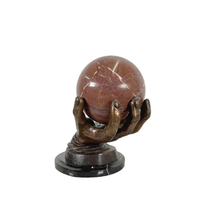 SRB41394 Bronze Hand holding Red Marble Ball Sculpture by Metropolitan Galleries Inc.