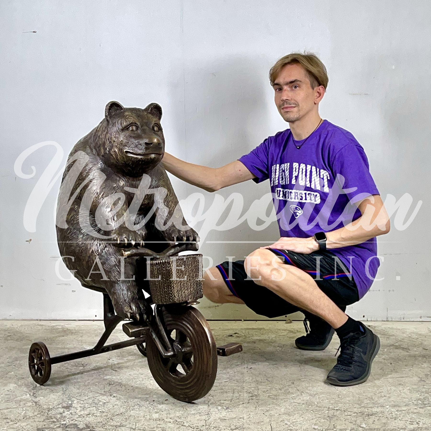 SRB10126 Bronze Bear riding Tricycle Sculpture exclusively designed and produced by Metropolitan Galleries Inc SCALE WM