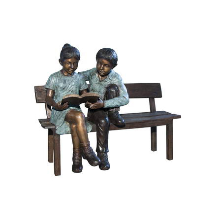 SRB050643_KIDS_READING_ON_BENCH